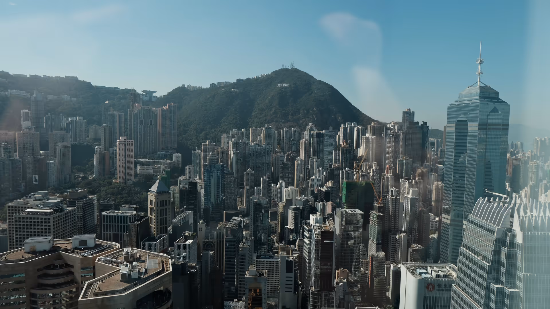 The Central skyline viewed from the Hong Kong Monetary Authority, densely packed towers rising toward Victoria Peak.