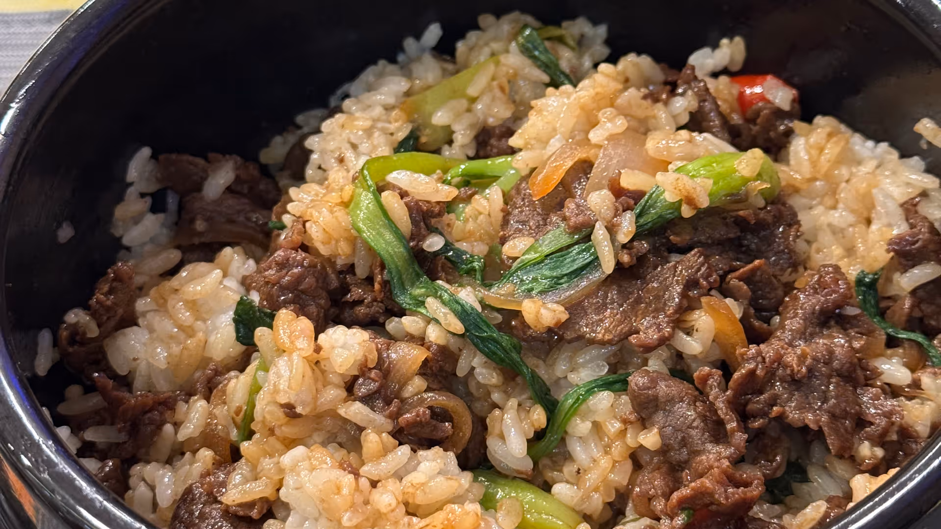 A stone bowl of North Korean bibimbap with beef and vegetables at the restaurant in Shanghai.